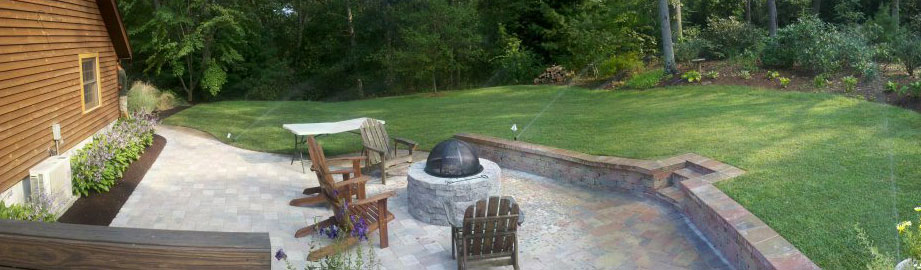 Backyard patio, firepit and retaining wall