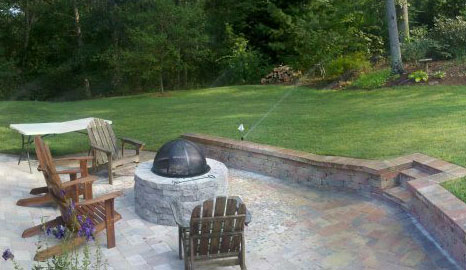 Backyard patio, firepit and retaining wall